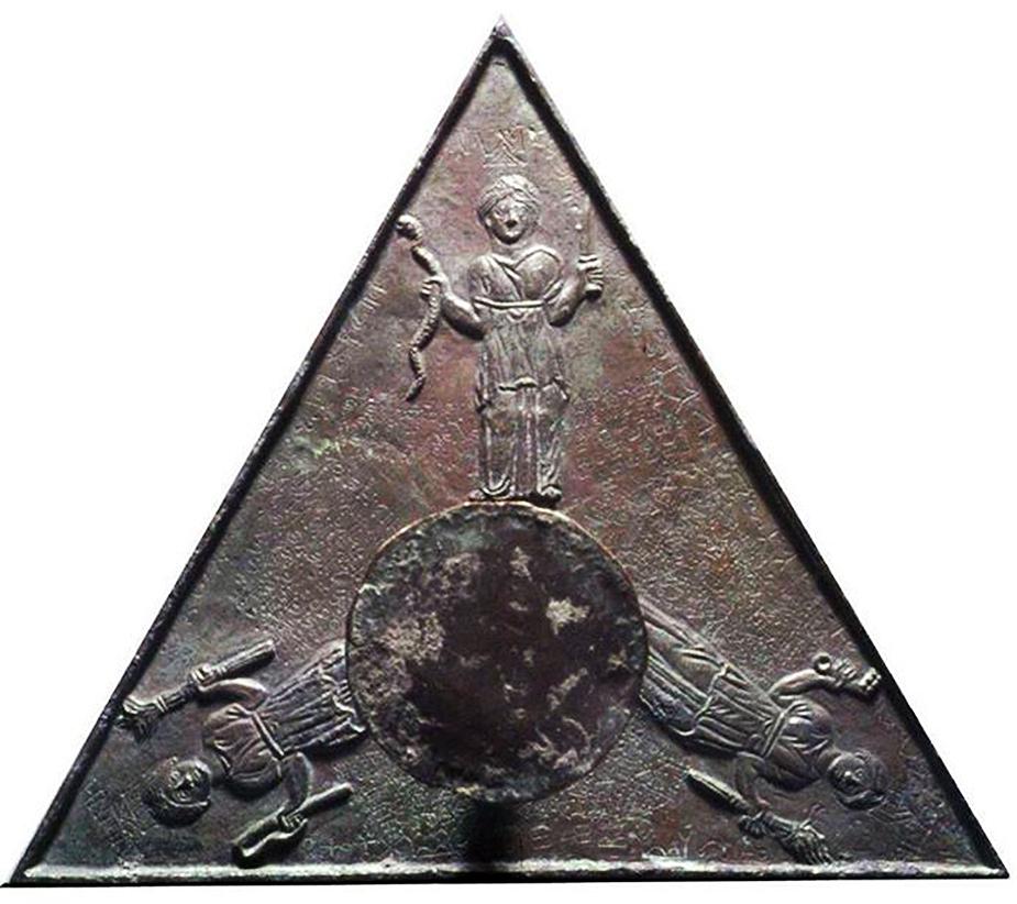 Triangular ancient magical artifact depicting a multi-formed goddess